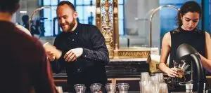 barista and bartender having fun